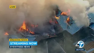 Flames tear through large three-story Encino home under construction