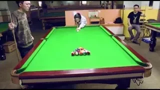 Chinese woman pulls off incredible trick shot