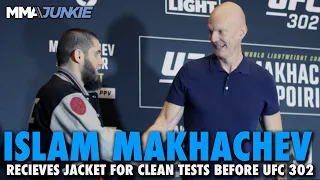 Jeff Novitzky Presents Islam Makhachev With Drug Test Jacket, Says 2016 Failure a Mistake