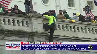 Mob of pro-Trump supporters seen scaling US Capitol building | ABC7