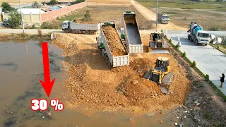 New Action Processing 30% Work by Heavy Dozer working push soil Filling up with dump truck DONGFENG
