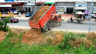 First Starting New project Landfilling using Dump truck Wheel 10 unloading stone and Dozer D21P push