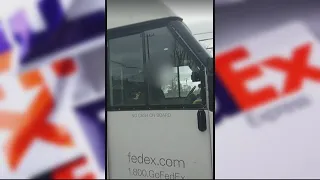 Detroit FedEx driver caught on video picking up sex worker