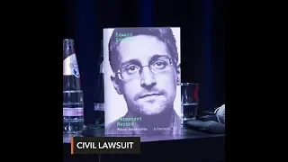 U.S. Justice Department sues Snowden over new book