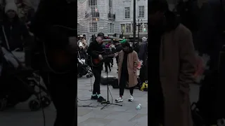 Piccadilly Circus :Camille Paul singing Shallow.