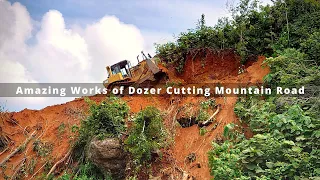 Bulldozer Cutting Mountain Road