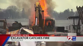 Excavator catches fire in Providence junkyard