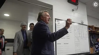 Rick Bowness receives a game puck after his return behind the bench