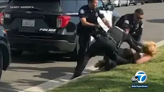 OC officer on leave after video shows him punch woman during arrest | ABC7