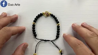 Pulsera para hombre en piedras Ónix y dije de Calavera 💀