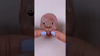 Sculpting a baby face/polymer clay