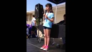 Student Dorothy Cho performs at the Blind Children's Learning Center 5k Walk