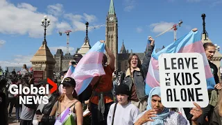 Dueling protests over the issue of transgender policy in schools were held in cities across