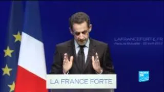 French President Nicolas Sarkozy addresses crisis during speech to supporters in Paris