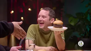 Burgers make Elijah Wood giggle