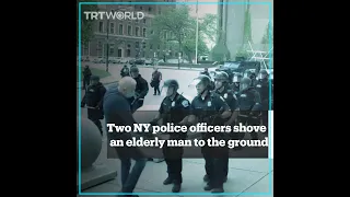 Two NY police officers shove an elderly man to the ground