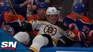 Klim Kostin Knocks Bruins' Lindholm Into Oilers' Bench With Huge Hit