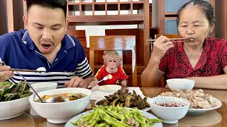 Bibi enjoys a hearty meal with Dad and Grandma!