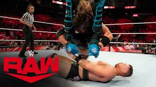 AJ Styles uses the momentum of Mustafa Ali’s 450 Splash to hit a devastating Styles Clash
