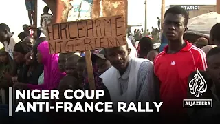 Niger coup supporters rally near the French embassy in Niamey