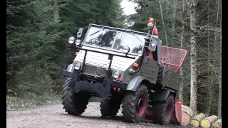 UNIMOG 411 mit FARMI-Winde beim Holz rücken