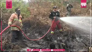 Indonesian firefighters battle underground fires