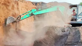 kobelco excavator working and BharatBenz loading dumper and SANY excavator working