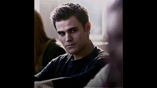 Stefan and Elena staring at each other in the class