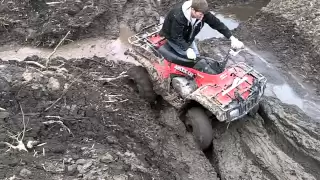 four wheeler getting stuck in mud