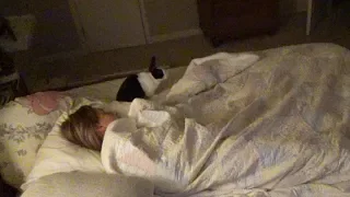 Rabbit wakes up sleeping girl for goodnight kiss!