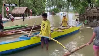 Typhoon Ulysses (Vamco): Small boat occupies a portion of the Calauag-Lopez road in Quezon