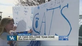 UK fans welcome home team