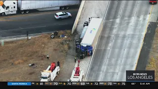 Fatal crash involving overturned big rig shuts southbound 15 down in Corona