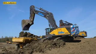 NEW Volvo EC950F excavators loading Volvo A60H trucks with dirt