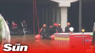 South Korean rescuers find more victims in flooded tunnel