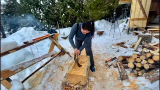 Life in the Siberian forest off grid.Taiga lonely log cabin.pov on the fire.