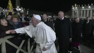Pope slaps hand of woman who yanked him toward her