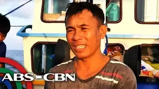Fish for alcohol, noodles: Filipino fishermen barter with Chinese at sea