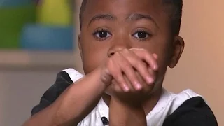 Boy with world's first double-hand transplant one year on