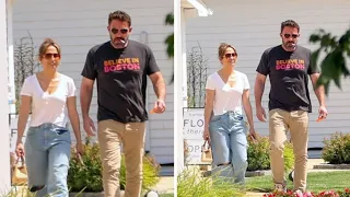 Ben Affleck is seen with a frown on a walk with Jennifer Lopez