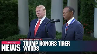 Tiger Woods receives Presidential Medal of Freedom from Donald Trump