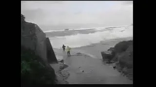 Elderly couple swept out to sea by giant waves