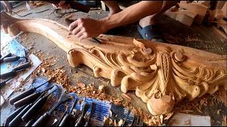 Skillful woodworking craftsman with rich experience creates intricate handcrafted wood carvings