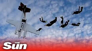 Stalling plane nosedives & nearly hits skydivers