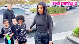 Kim Kardashian Disciplines Saint West For Giving Paparazzi The Middle Finger & Talks Skims Models