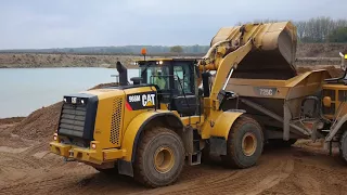 CAT 966M loading 725C BELL B25D