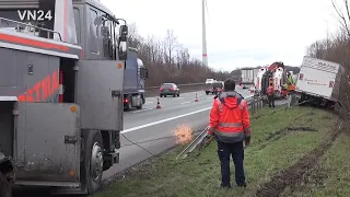 16-01-2023 - VN24 - Truck on freeway goes off road - several winches in use for rescue