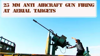 23 mm anti aircraft gun based on a 1.5 ton truck is firing at aerial targets