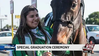 Video: BCSO escorts fallen deputy's daughter at HS graduation, honors her father