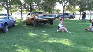 Cute girl and cool car at low rider show in Stockton, Ca a while back